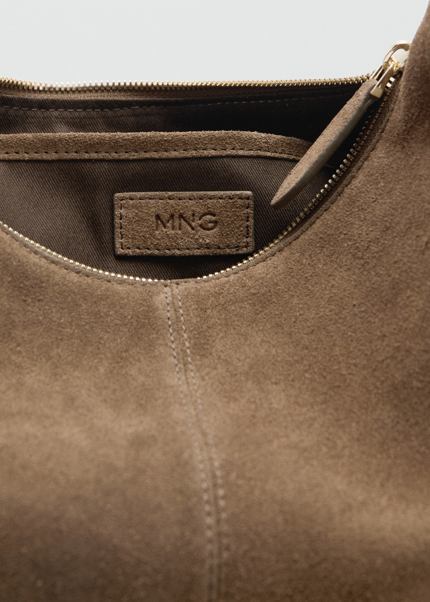 Suede shoulder bag with stitching