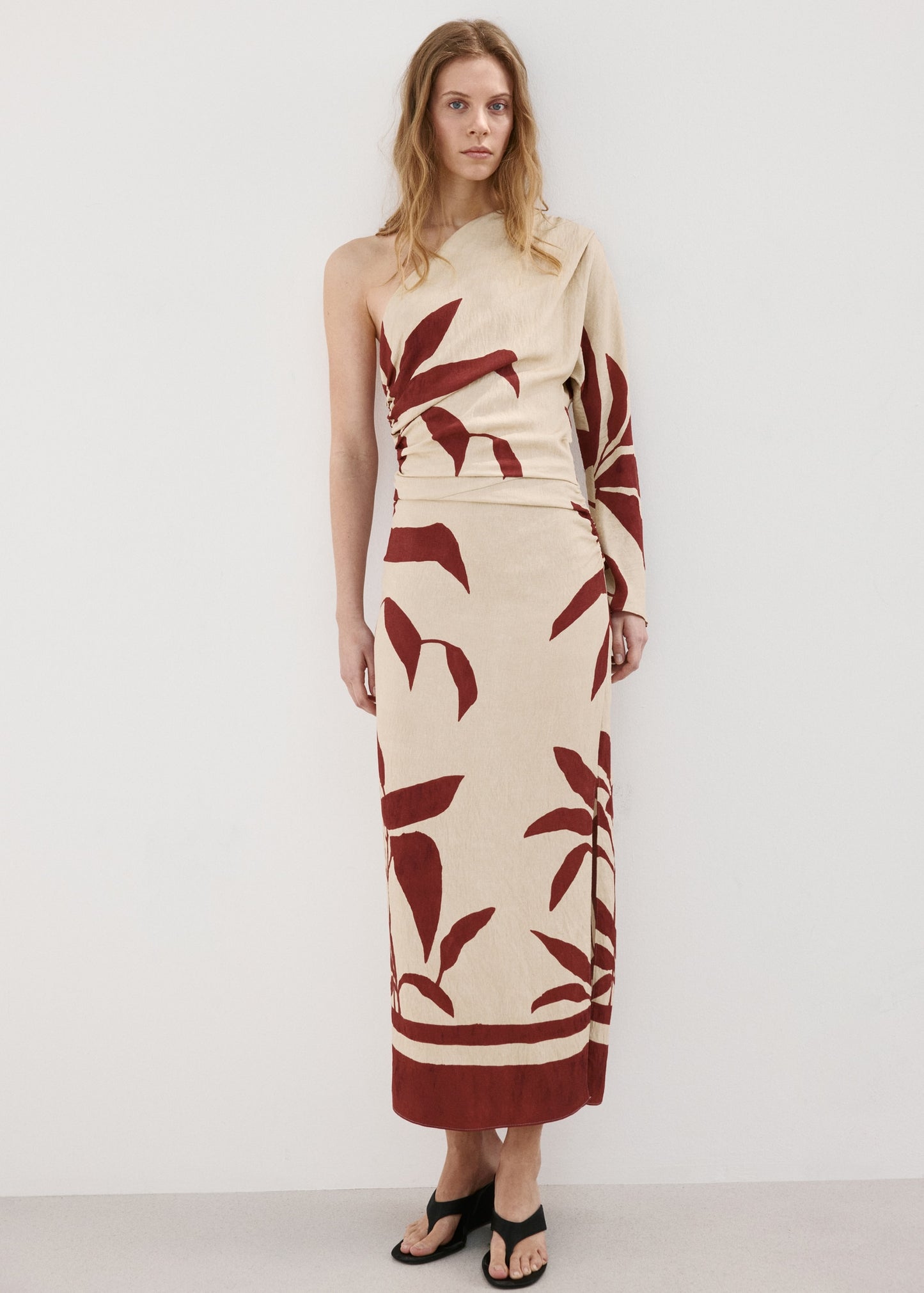 Asymmetrical dress with gathered body