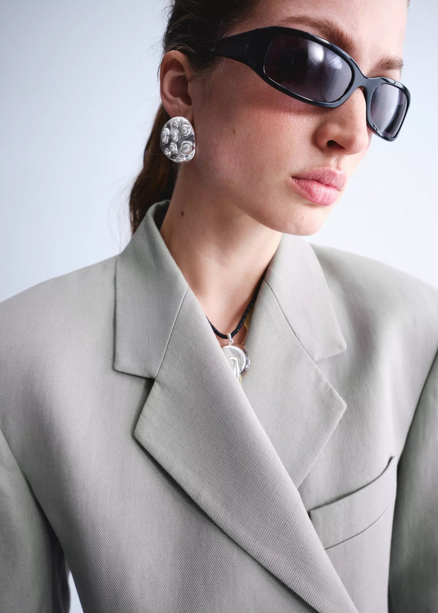 Double-breasted blazer with button closure