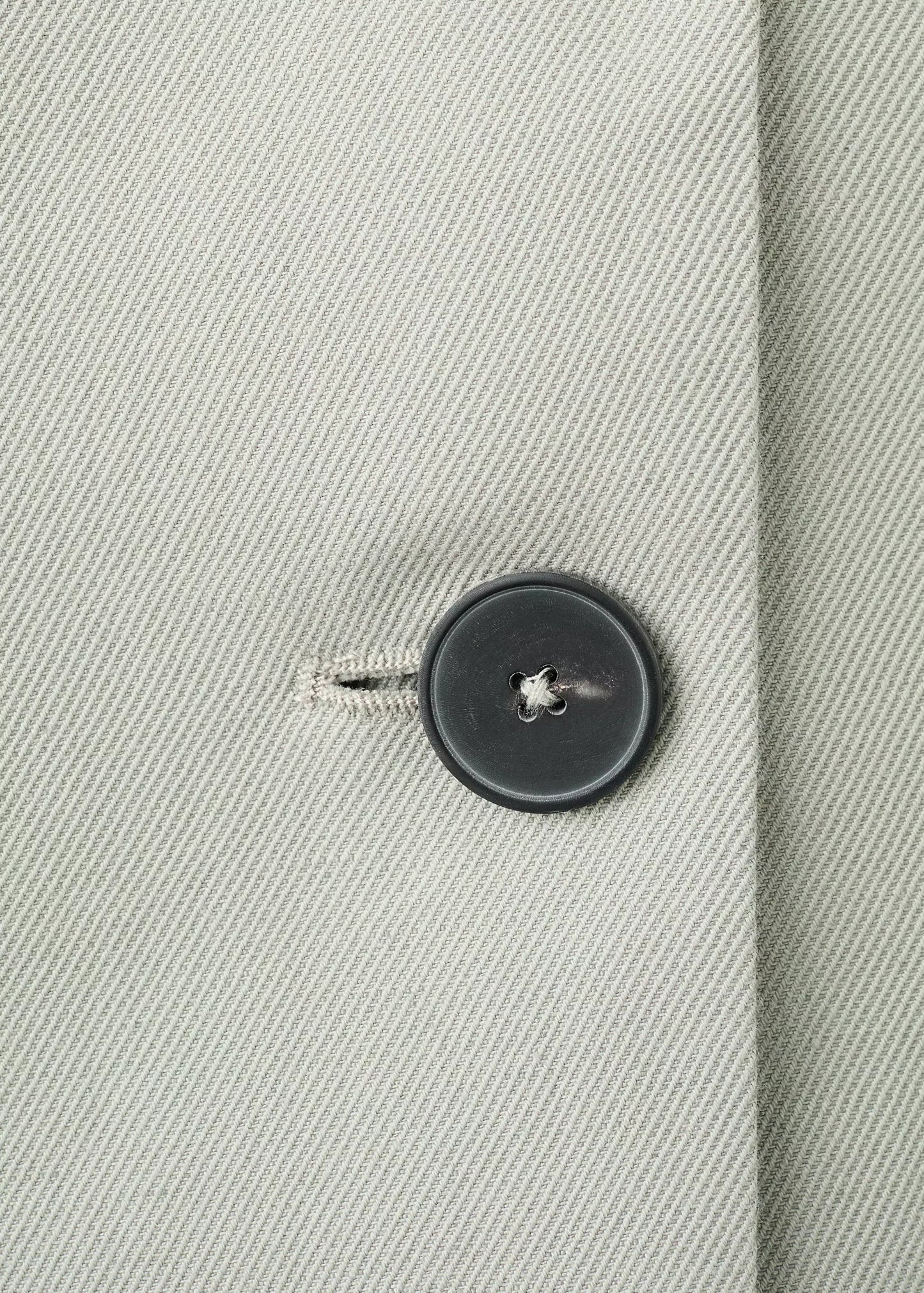 Double-breasted blazer with button closure