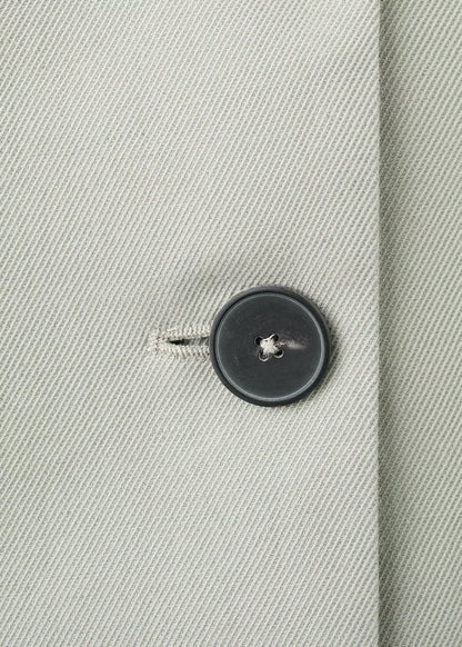 Double-breasted blazer with button closure