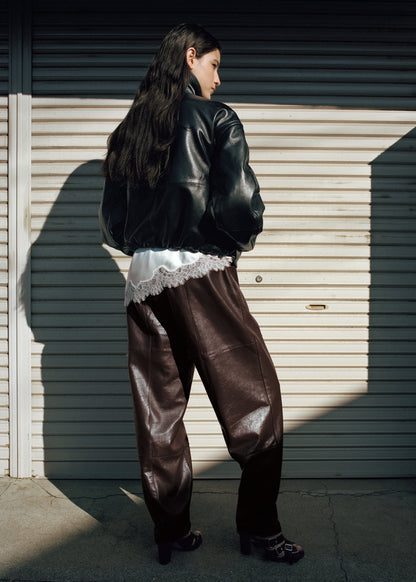 100% leather trousers with buttoned cuffs