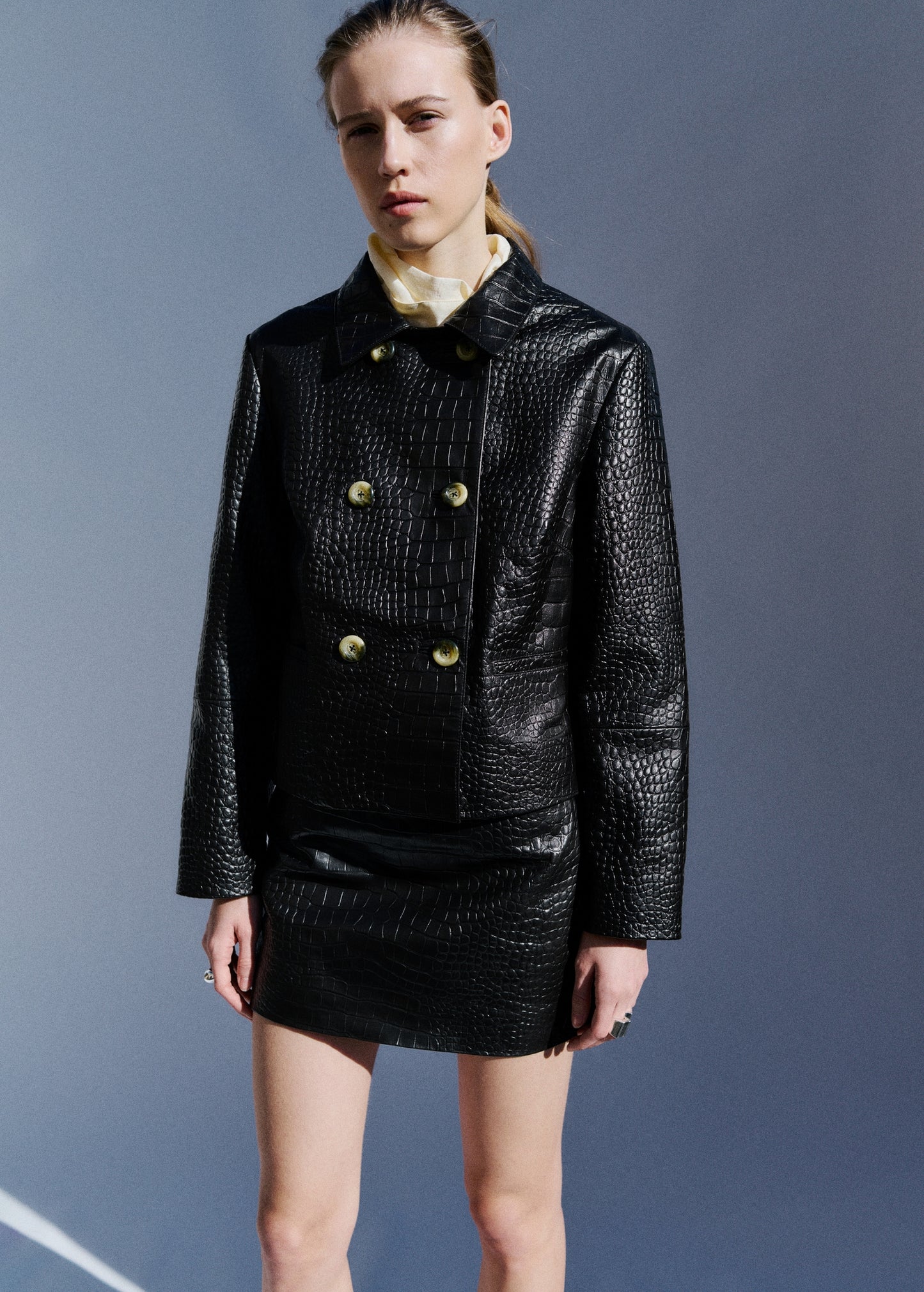 Leather miniskirt with crocodile effect