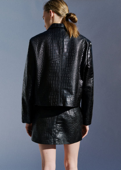 Leather miniskirt with crocodile effect