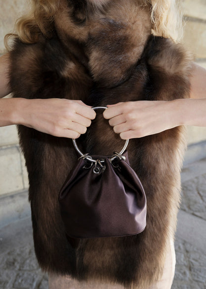 Handbag with metal handle