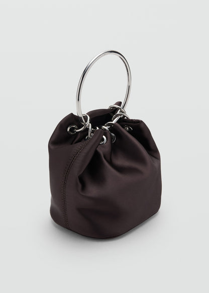 Handbag with metal handle