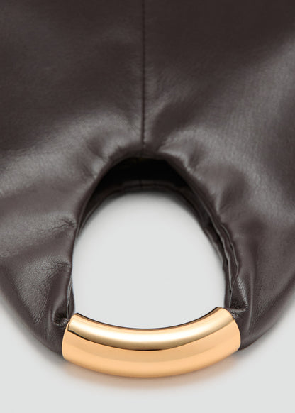 Handbag with metal handle