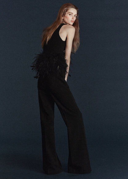 Knitted top with feather