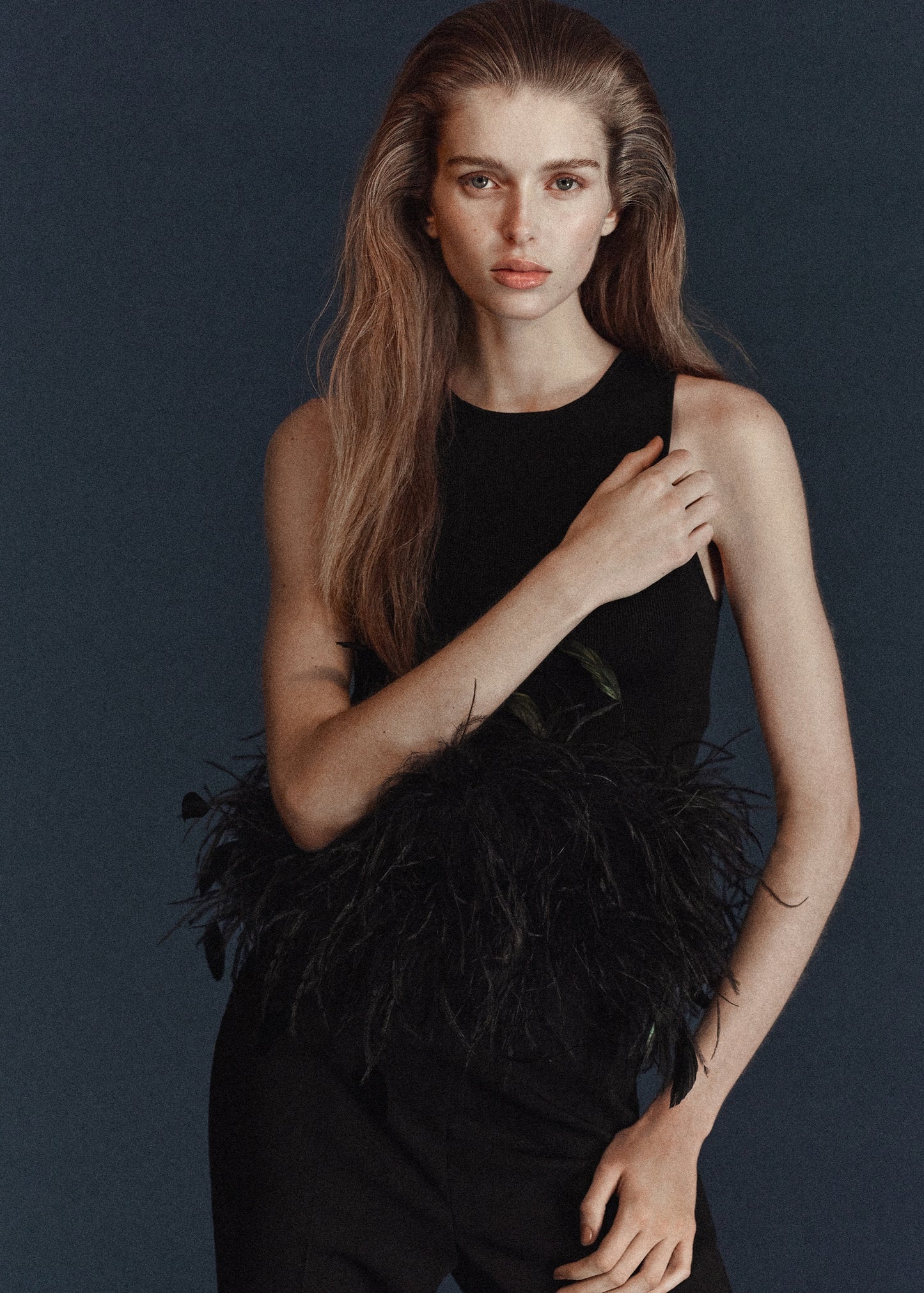 Knitted top with feather