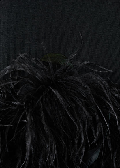 Knitted top with feather