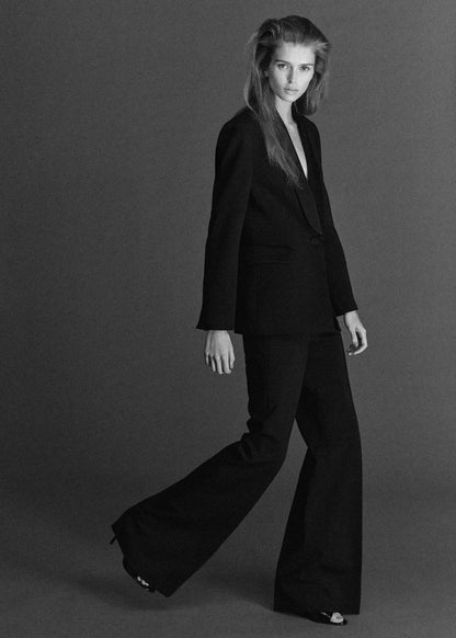 High-waist flared trousers