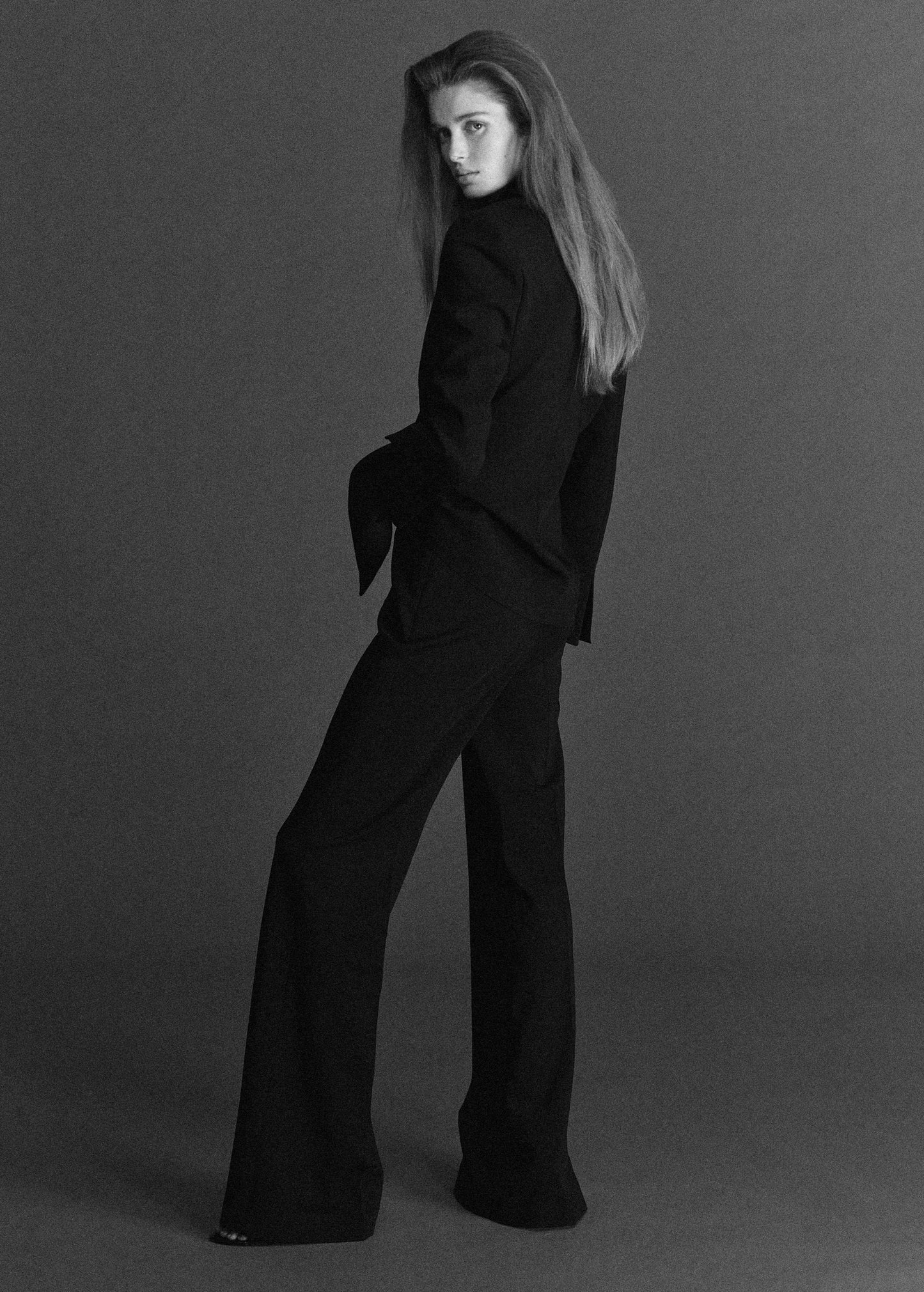 High-waist flared trousers