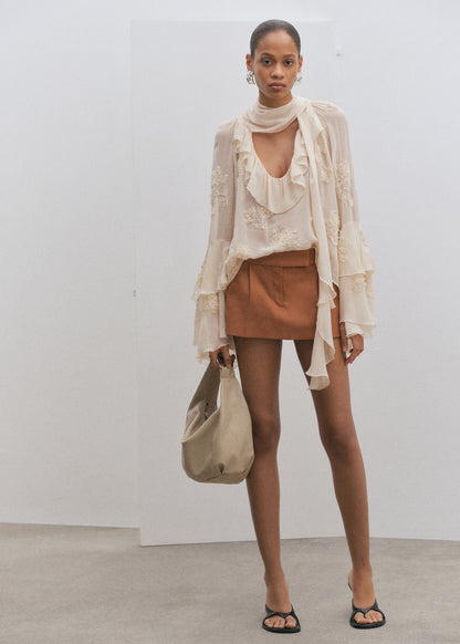 Mini-skirt with pleats