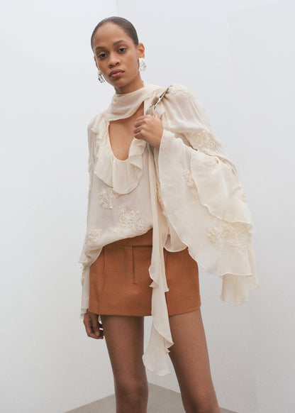 Mini-skirt with pleats