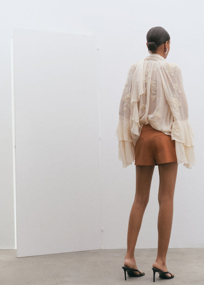 Mini-skirt with pleats