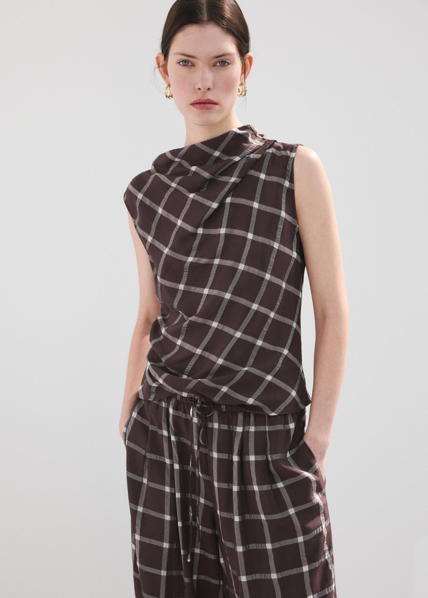 Fitted top with draped neckline