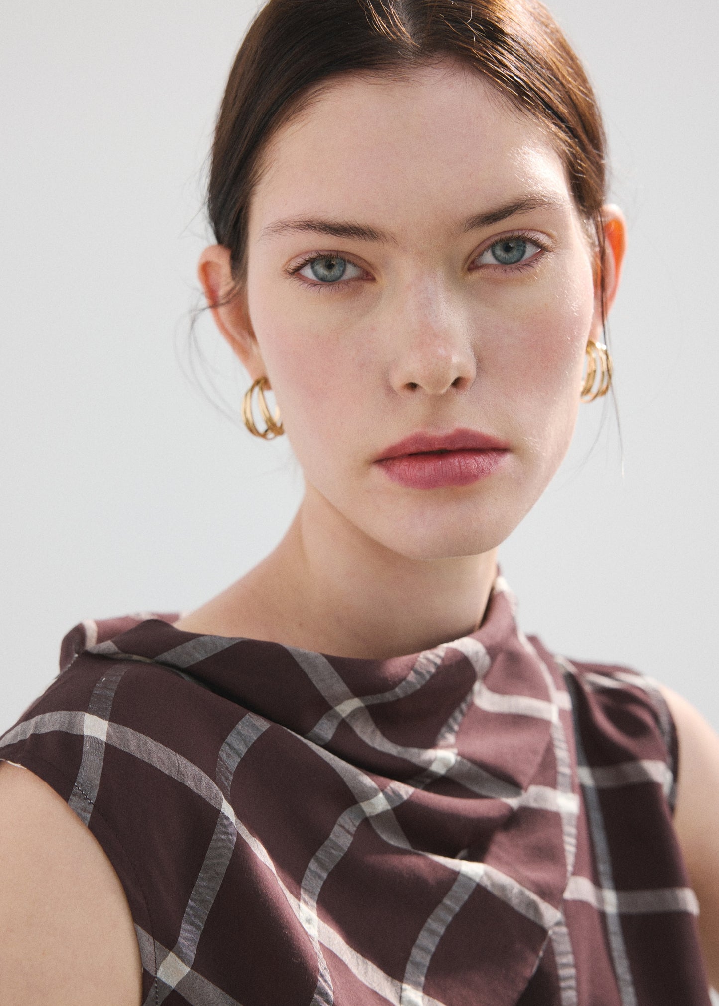 Fitted top with draped neckline