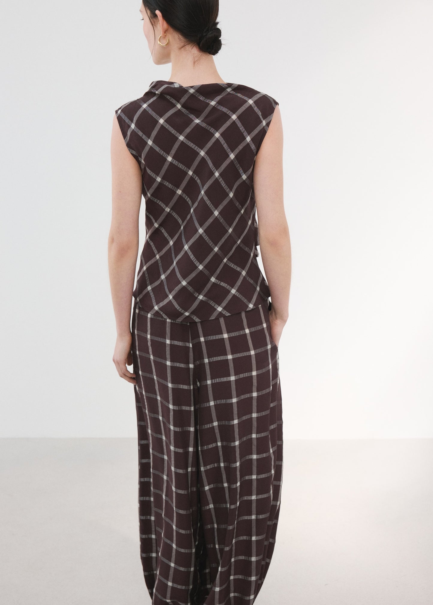 Fitted top with draped neckline