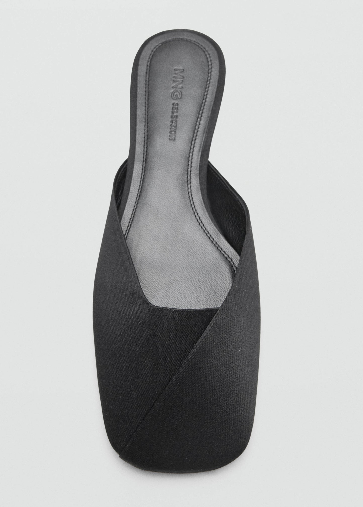 Backless flat shoe