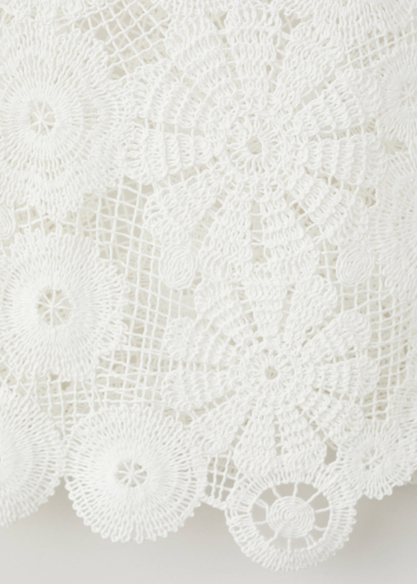 Embroidered top with openwork details