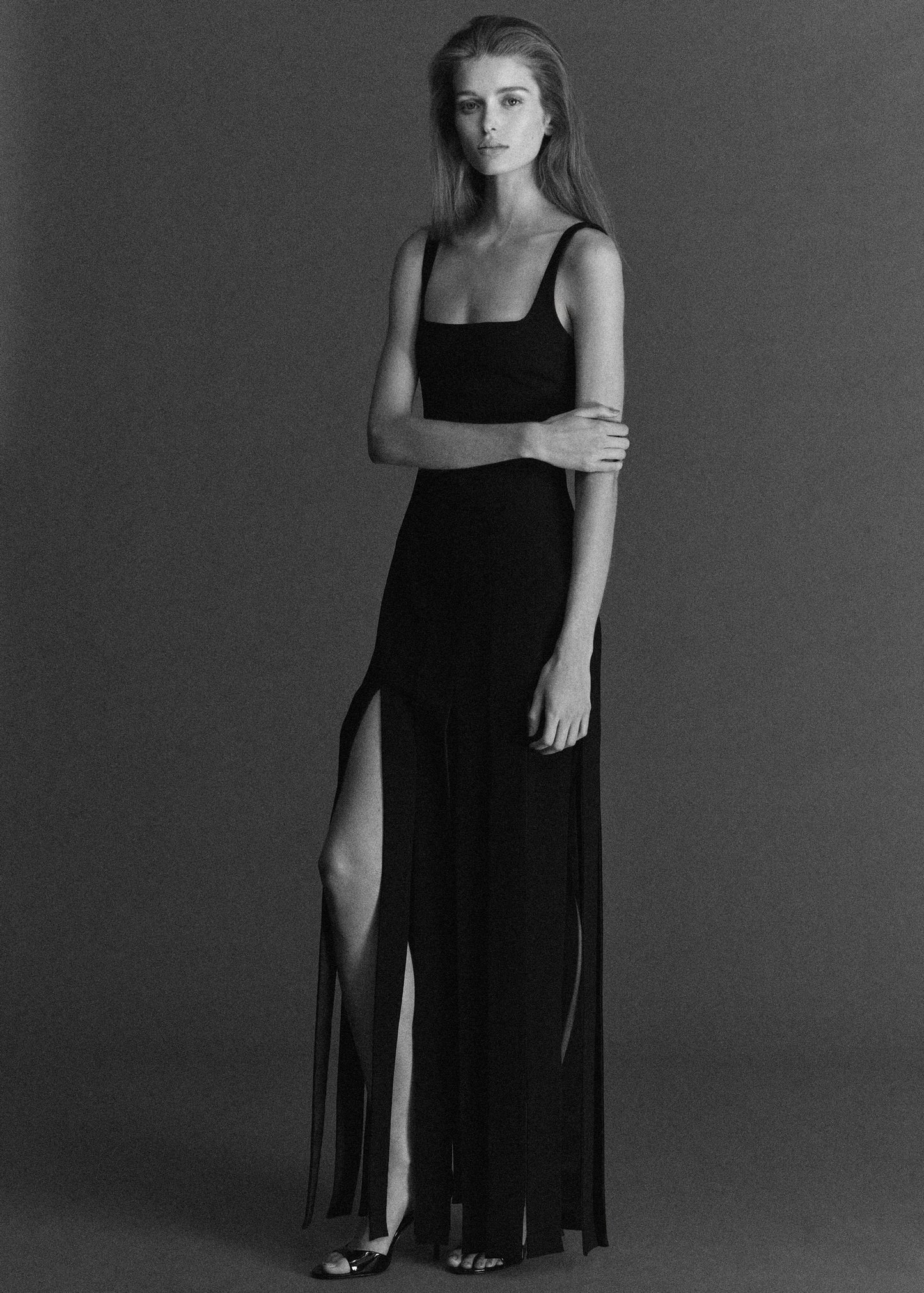 Low-cut dress with fringed hem