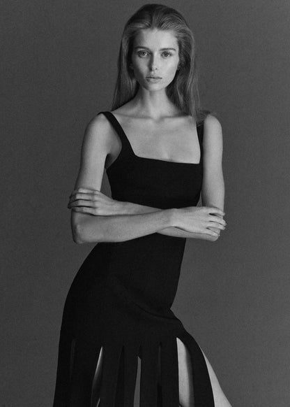 Low-cut dress with fringed hem