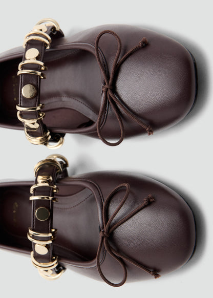 Ballet pump with metallic strap details