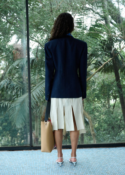 Midi skirt with pleated asymmetric hem