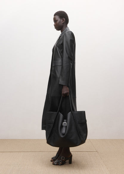 Straight coat with 100% leather pockets