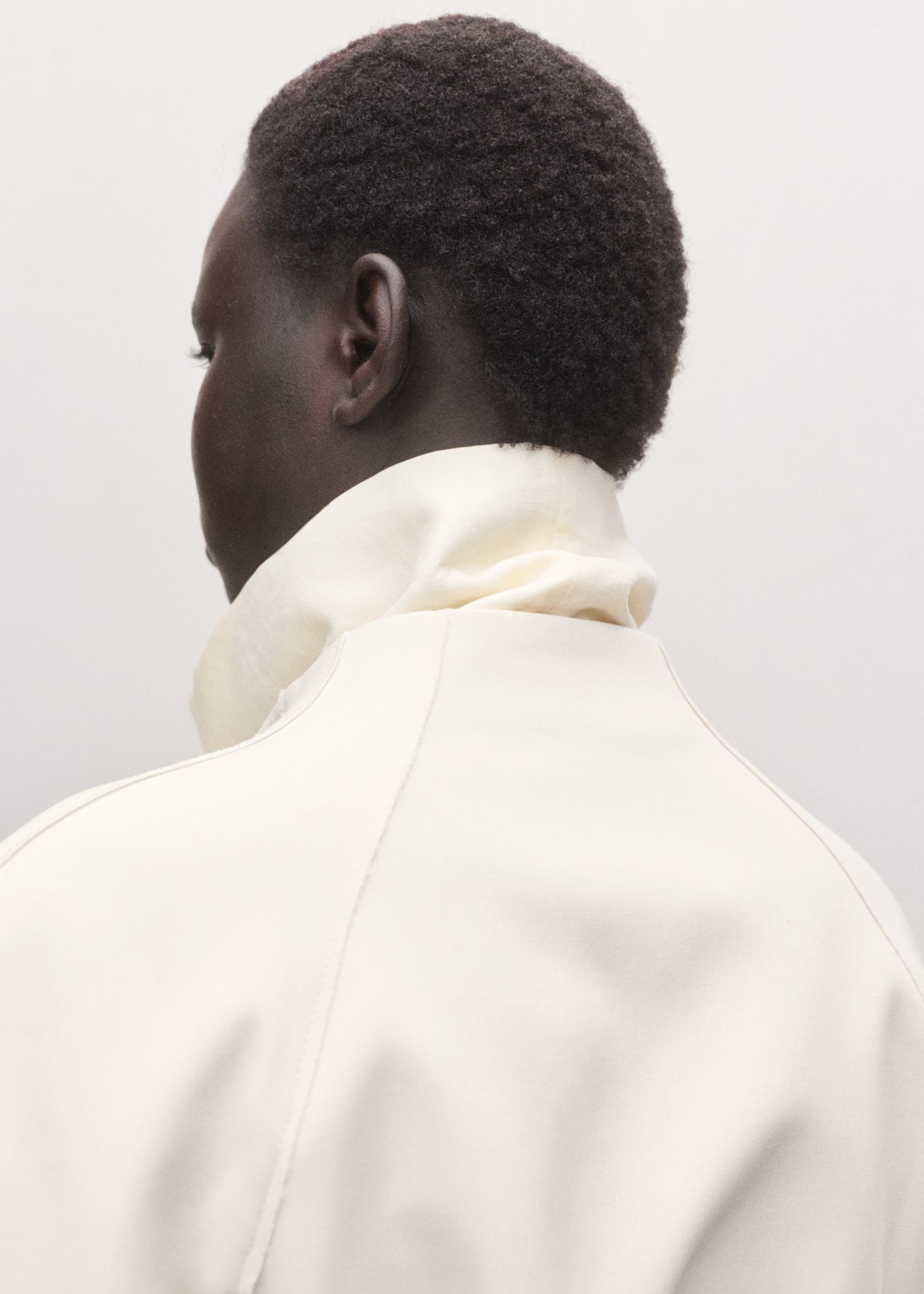 Jacket with lapels and tie belt