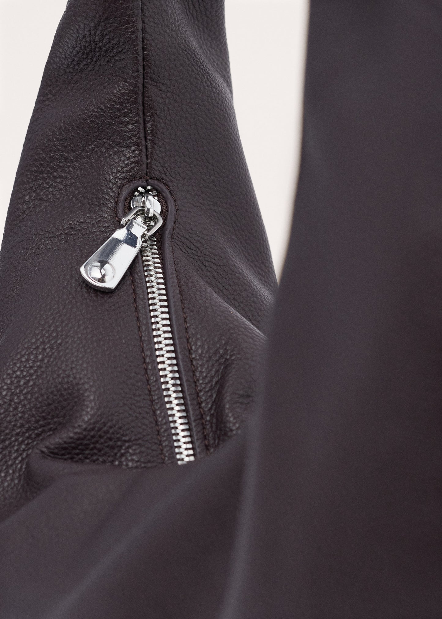 Oval leather shoulder bag