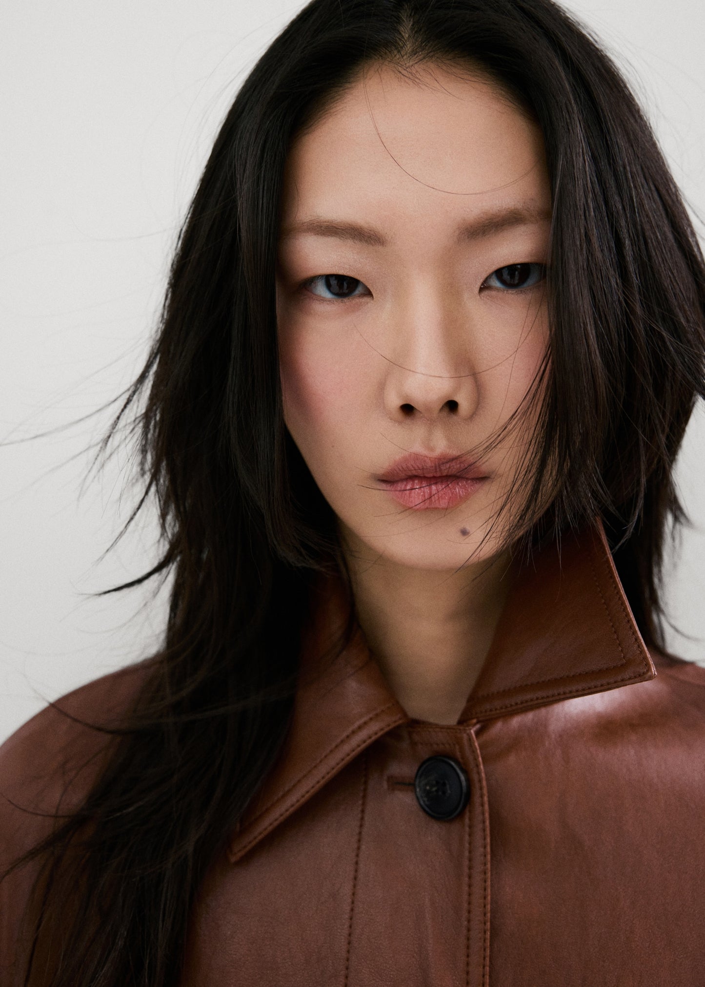 Long faux-leather trench coat with belt