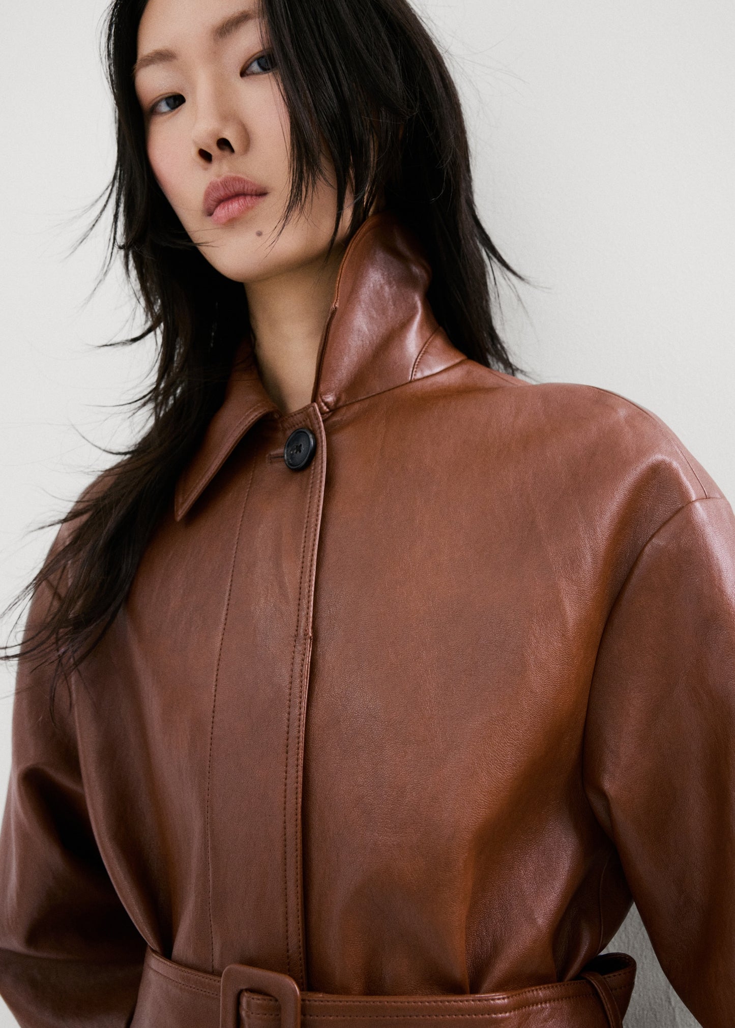Long faux-leather trench coat with belt
