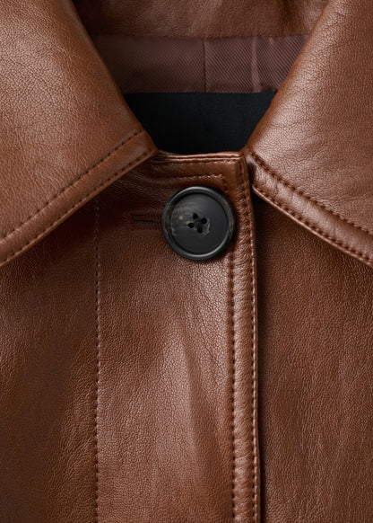 Long faux-leather trench coat with belt
