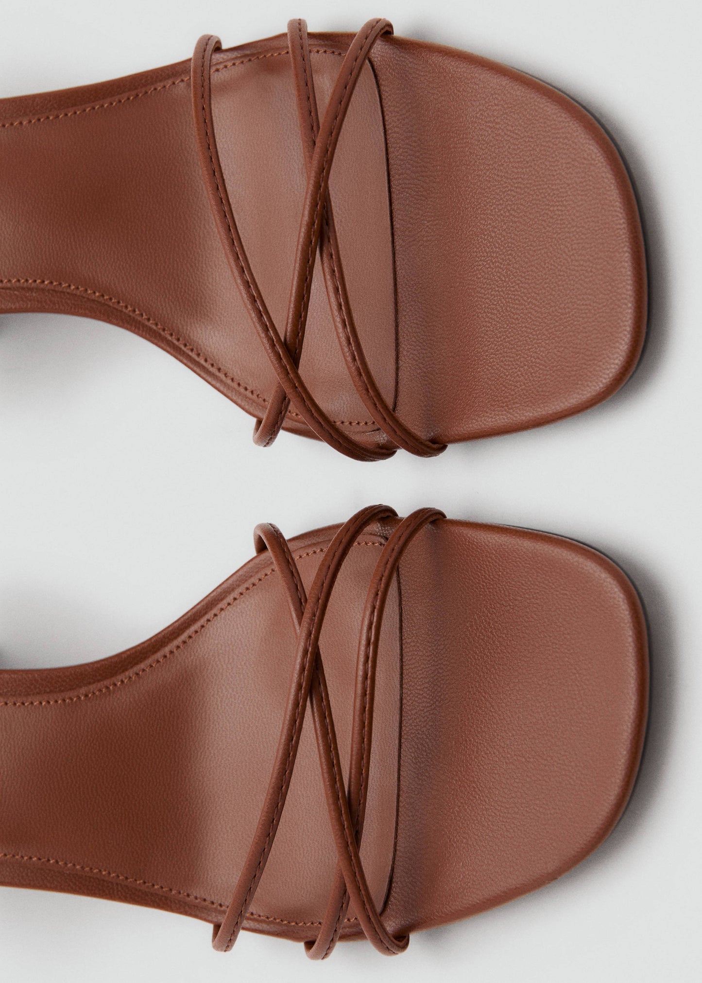 Heeled sandals with straps