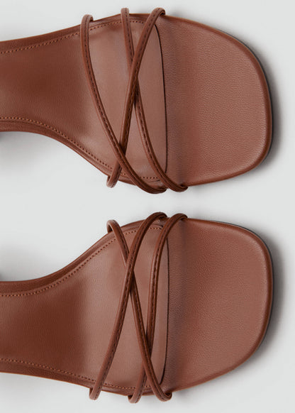 Heeled sandals with straps