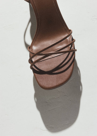 Heeled sandals with straps