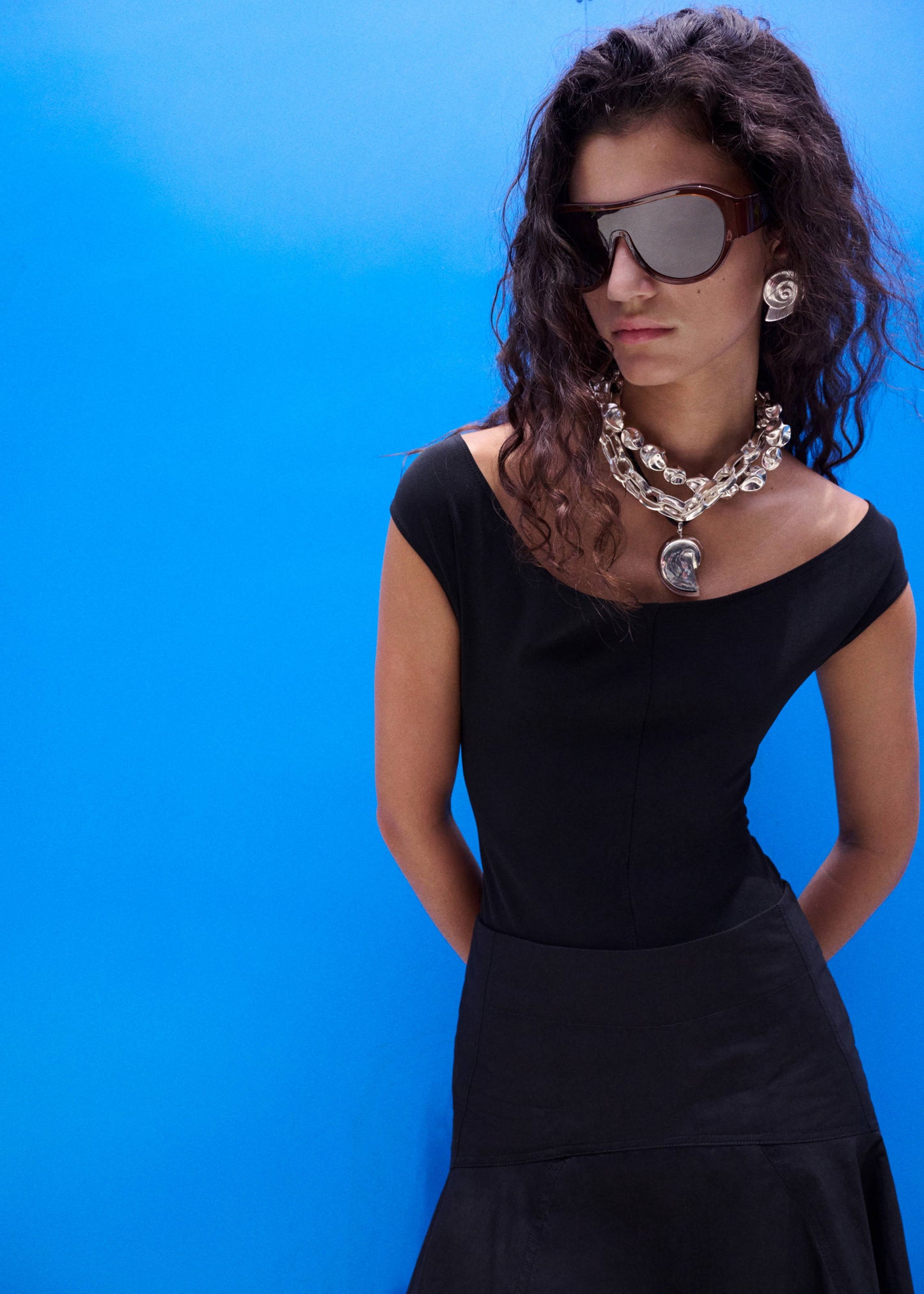 Fitted bodysuit with open back