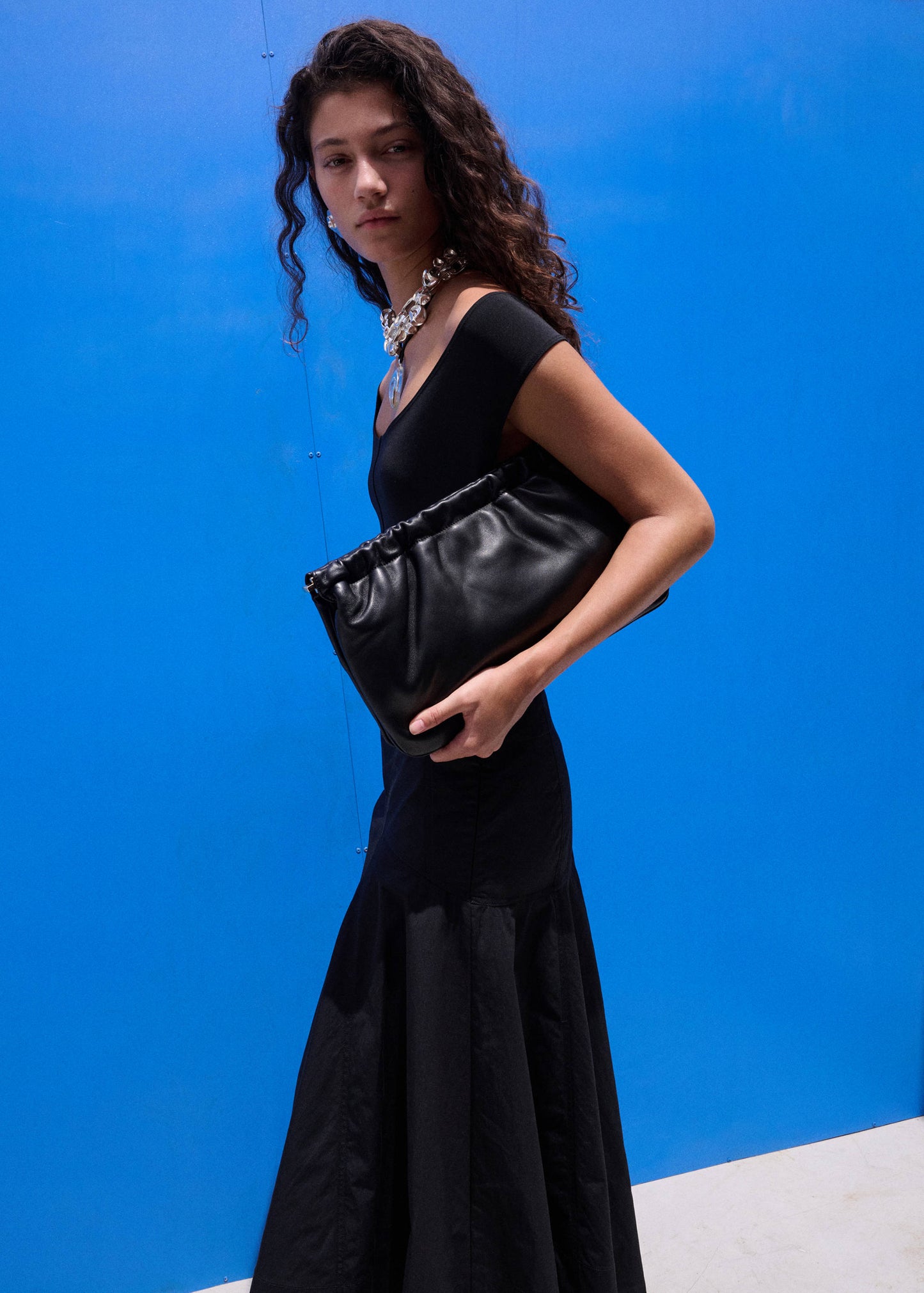 Fitted bodysuit with open back