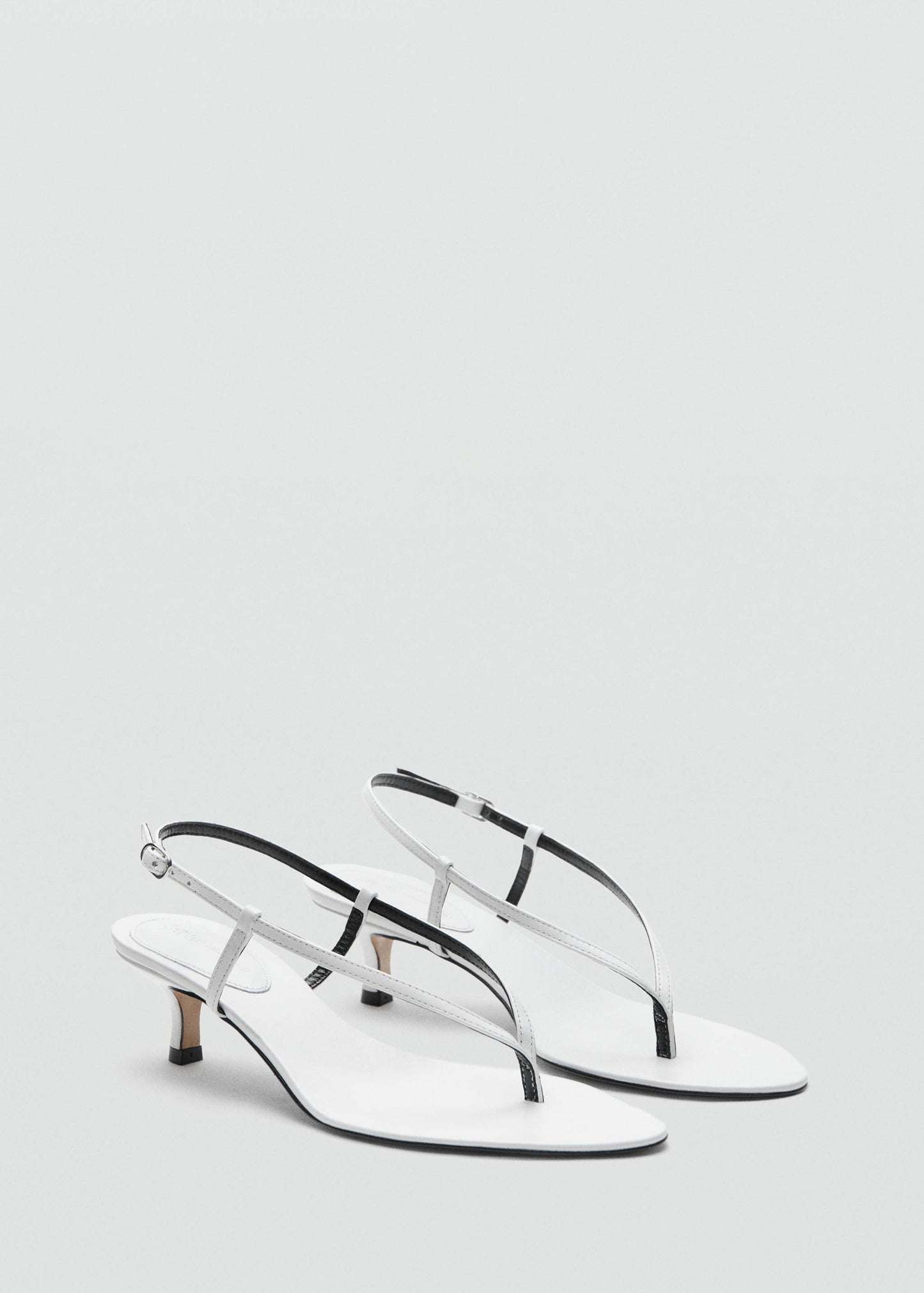 Heeled leather sandals with straps