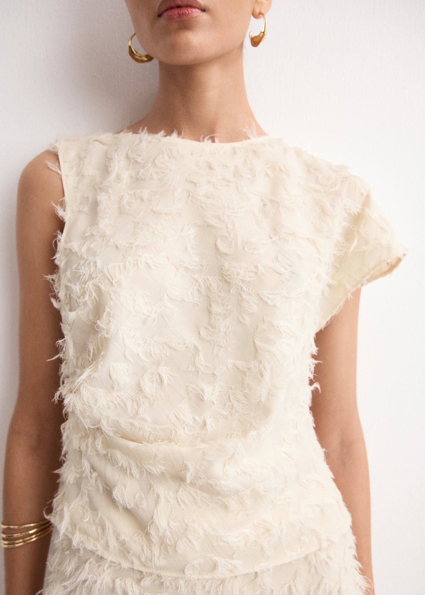 Asymmetrical speckled top