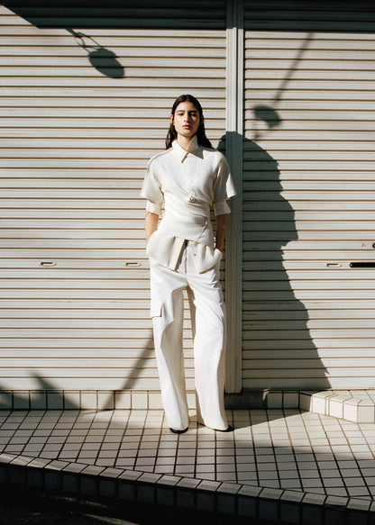 Fitted cotton t-shirt with asymmetrical hem