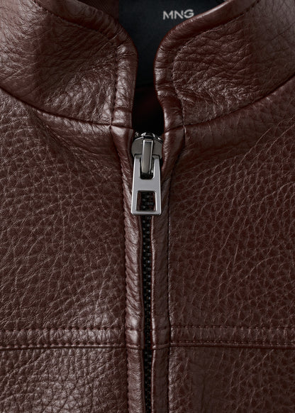Collarless jacket with pockets