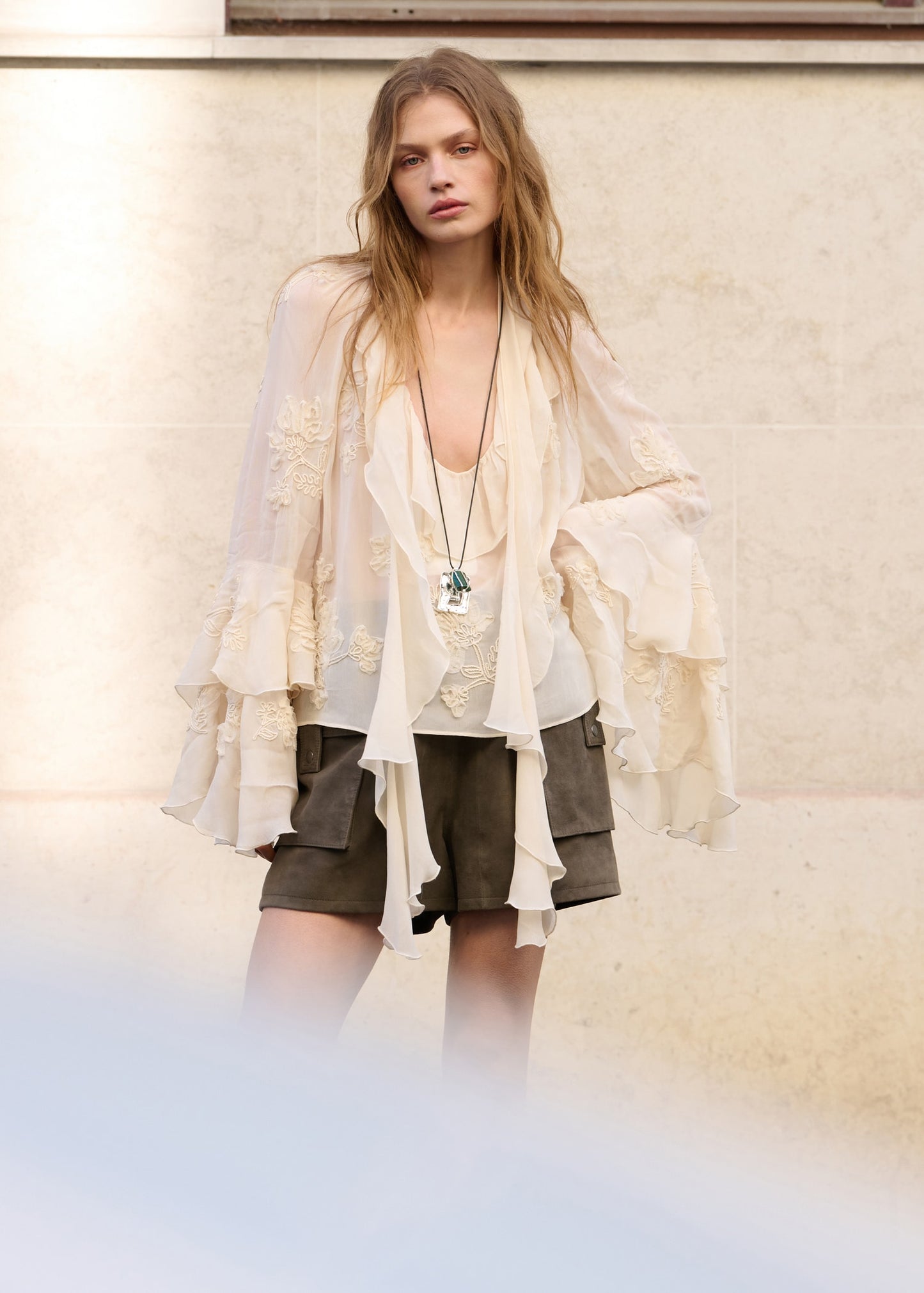 Ruffled blouse with bow neck