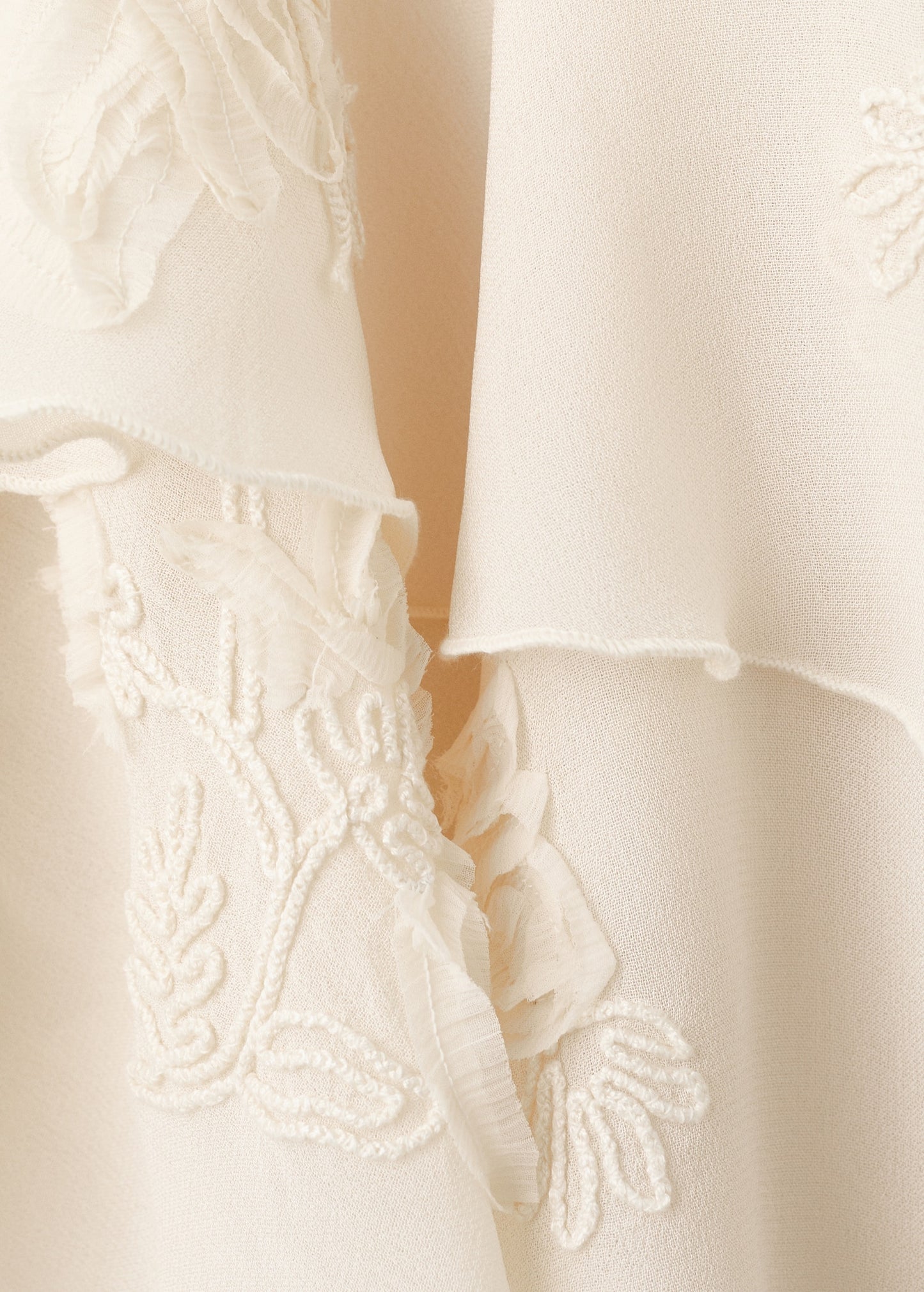 Ruffled blouse with bow neck