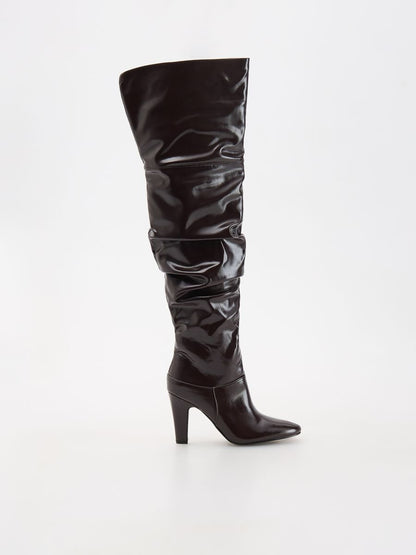 Draped over the knee midi heel boots