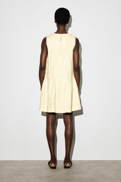 Sculpted pleated mini dress