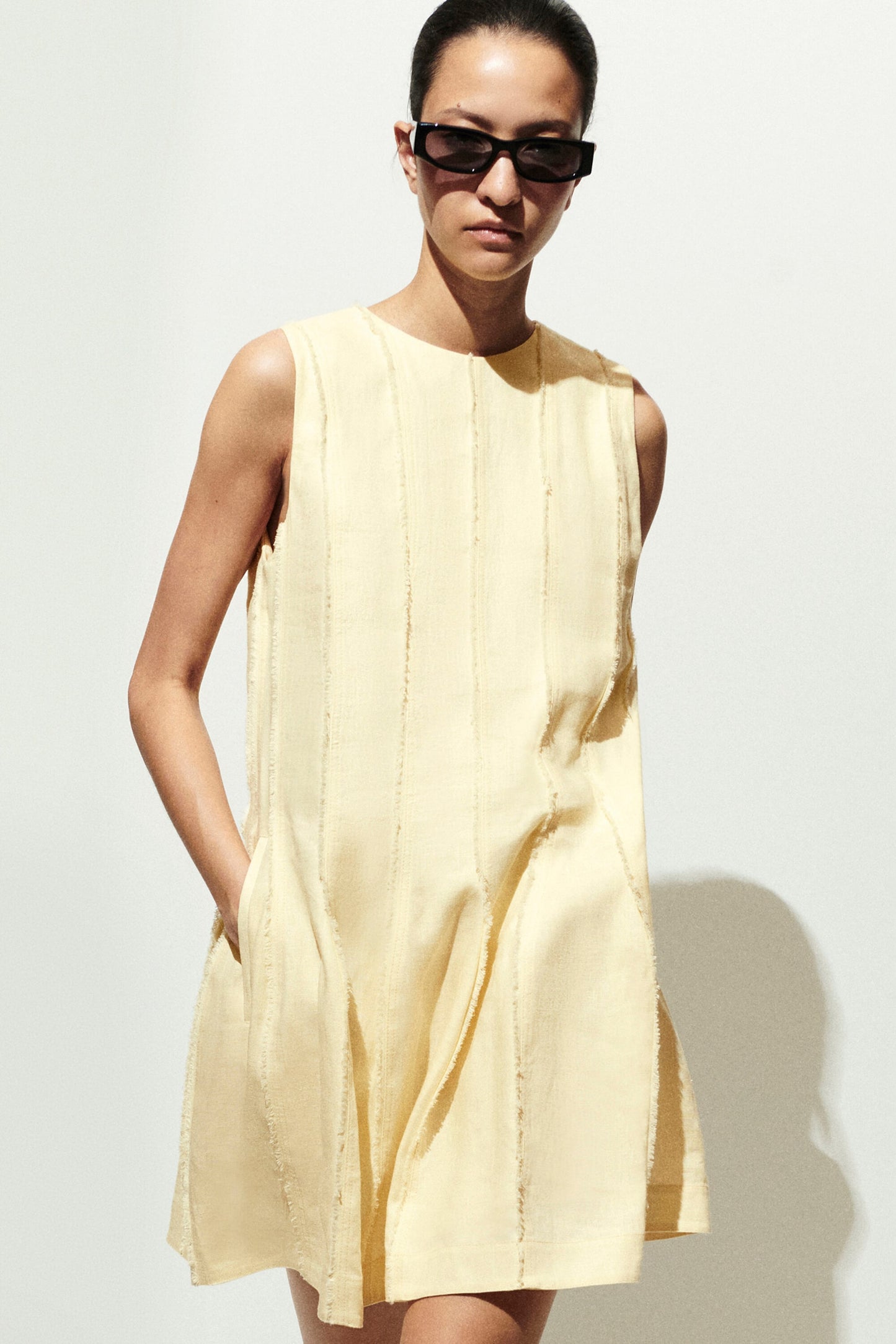 Sculpted pleated mini dress