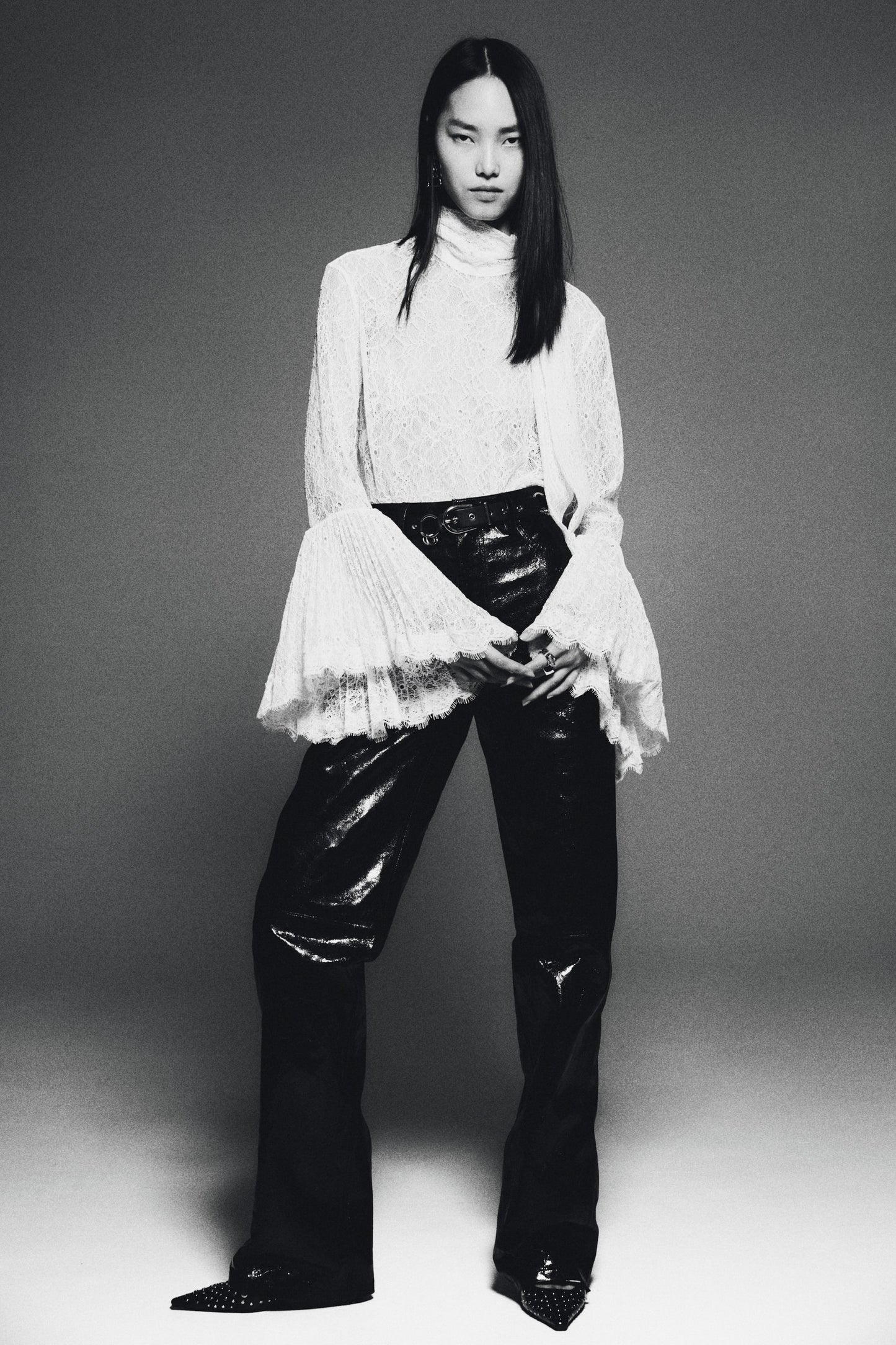 Trumpet-sleeved lace blouse