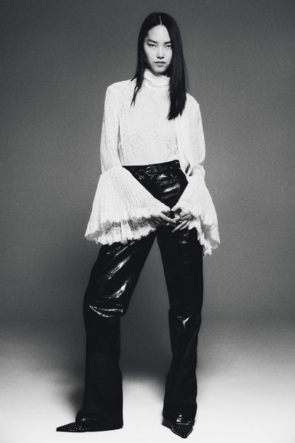 Trumpet-sleeved lace blouse